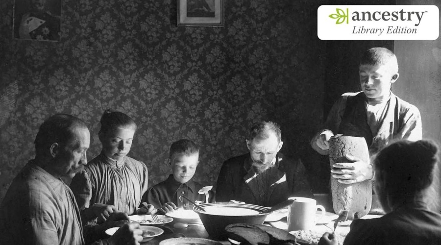 Old photo of family around table