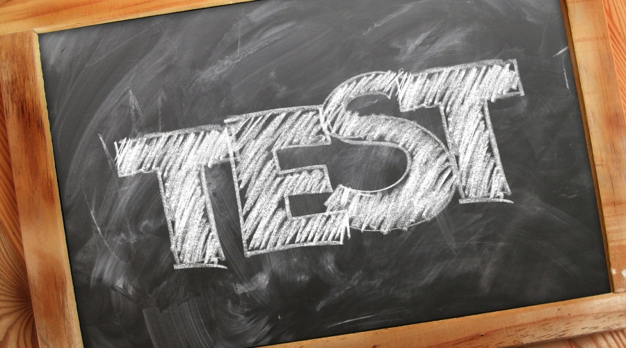The word test written on a small chalk board
