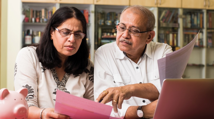 Senior couple working on paperwork
