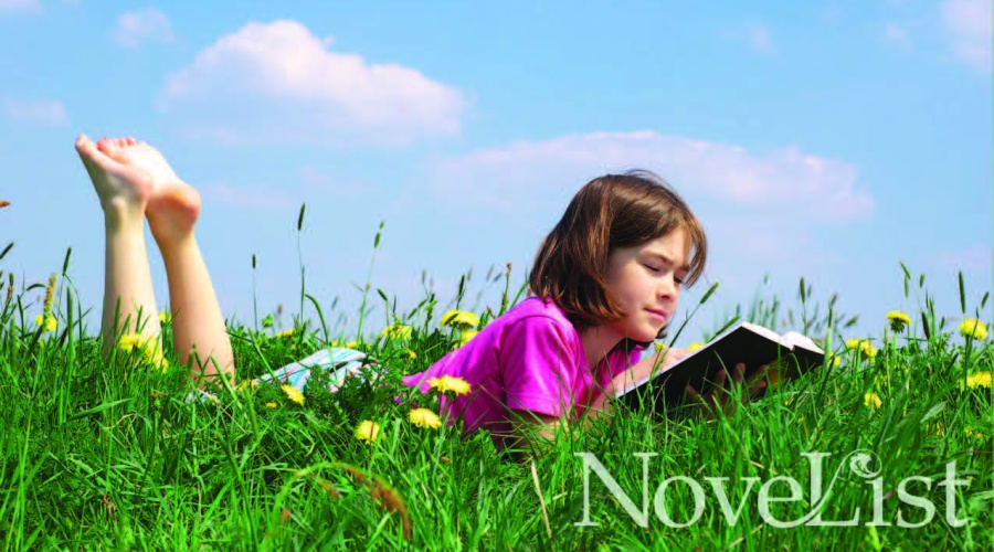 Young girl reading book