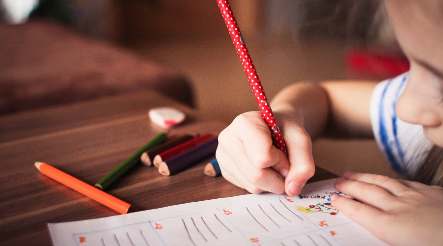 Girl working on homework sheets