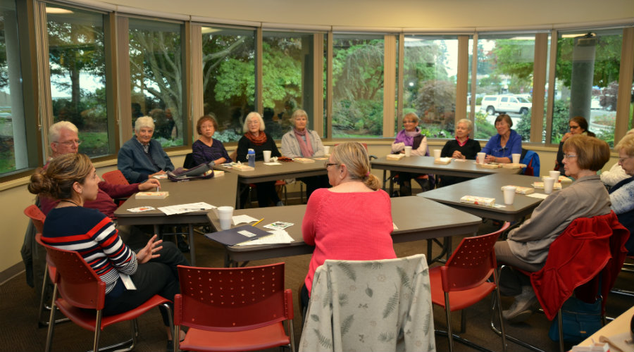 Group at round table in meeting room