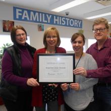 Cloverdale staff with Family Search certificate