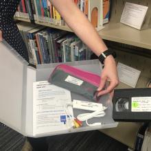 Elgato digitizing kit held by staff member