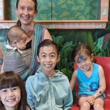 Caregiver with four children at Guildford branch