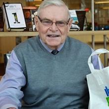 Read-ability volunteer with home delivery bag