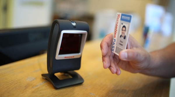 Person scanning recreation pass
