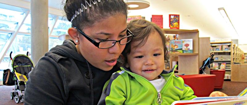 Mother reading to a toddler