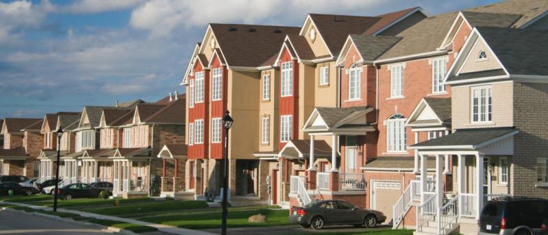 Houses and cars on a suburban street