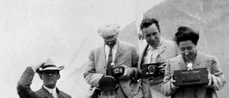 vintage photograph of a group of people holding cameras