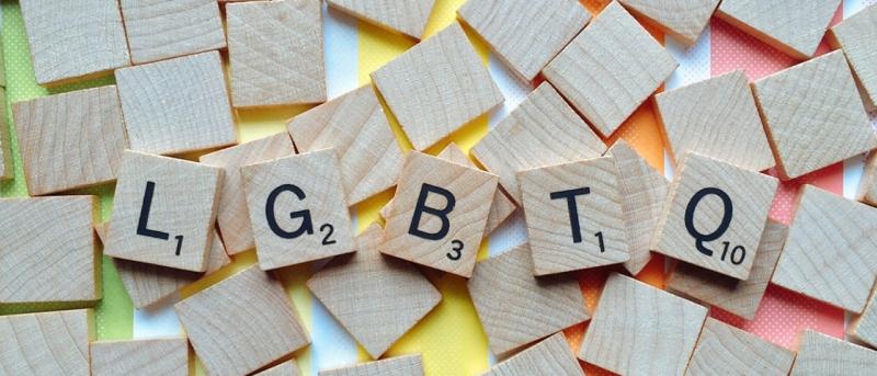 Scrabble tiles spelling out LGBTQ